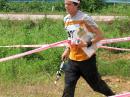 Charles Scharlau, NZ0I, carries his ARDF set, map and water bottle as he runs the finish corridor at the 2008 ARDF World Championships in Korea. [Dale Hunt, WB6BYU, Photo]