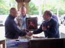 Martin F. Jue, K5FLU, of MFJ Enterprises, accepts the ARRL Special Achievement Award from ARRL Chief Operating Officer Harold Kramer, WJ1B.