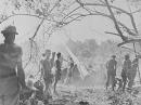 US Army in final drive on Guadalcanal. American soldiers, clad in the briefest clothing because of intense heat, blast away at the few remaining enemy positions left on Guadalcanal in the Solomons during the final offensive that led to liberation of the island.